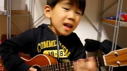 littleboyplayingaukulele